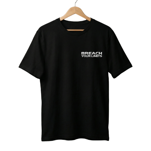 Black t-shirt with 'Breach Your Limits' text on a hanger against a white background