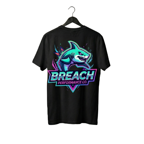 Black t-shirt with a shark graphic and 'Breach Performance Co.' text on a hanger against a white background